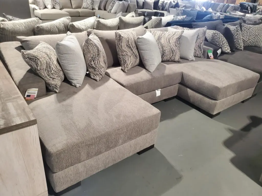 Sofa, Chairs, and Cushions in a Showroom