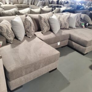 Sofa, Chairs, and Cushions in a Showroom