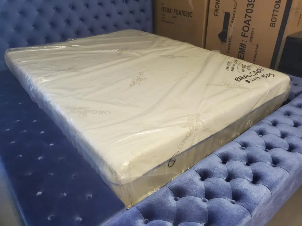 A Foam Mattress With a Plastic Wrap