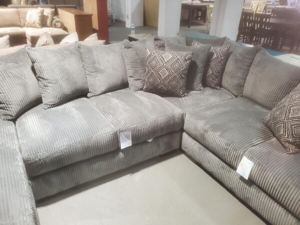 An L Shape Couch in Grey Color Shade